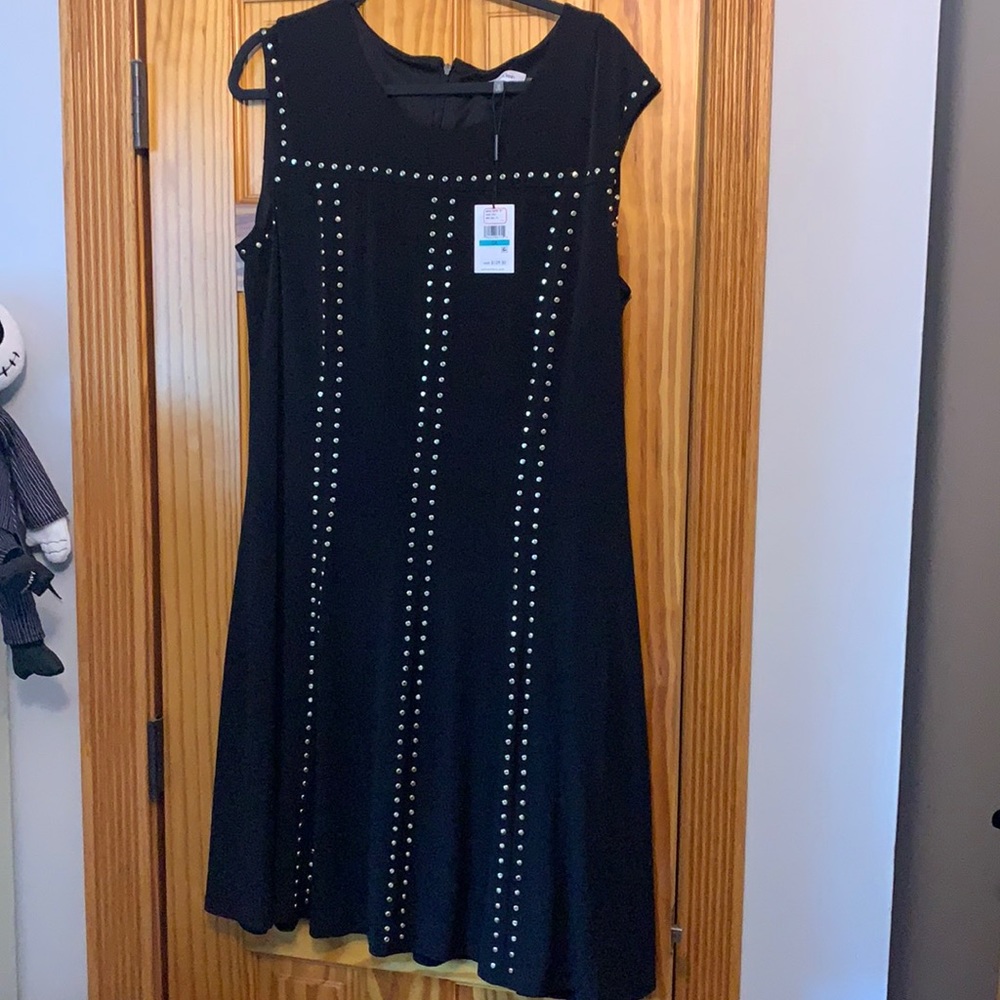 Calvin Klein dress tags still on!